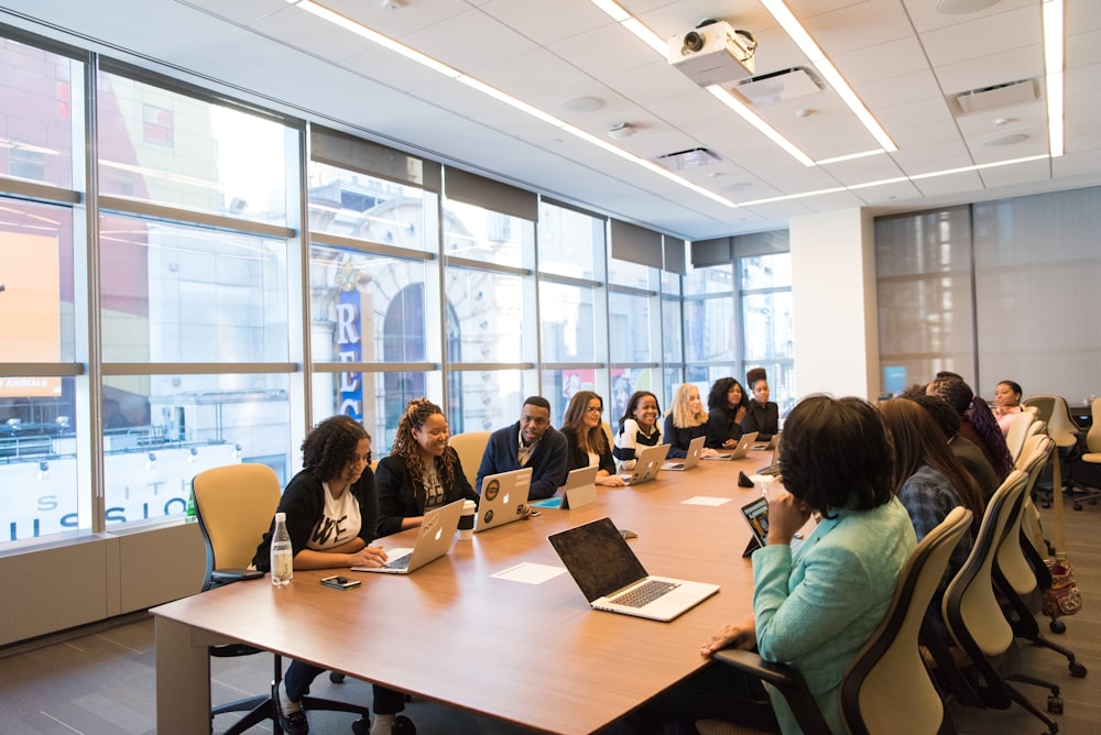 Insurance advisors reviewing client policies to find savings